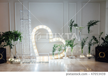 Wedding reception decoration with different electric edison lamps and fresh flowers, rustic style Wedding reception decoration with different electric edison lamps and fresh flowers, rustic style 47053439