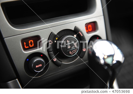 controls near the steering wheel in a modern car controls near the steering wheel in a modern car 47053698