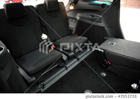 New car inside. Clean car interior. Black back seats transformer in sedan. Car cleaning theme. 47053728