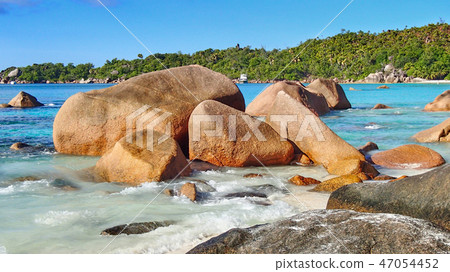 Size Typical boulders in the water at the beach 47054452