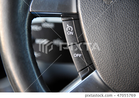 controls near the steering wheel in a modern car controls near the steering wheel in a modern car 47055769