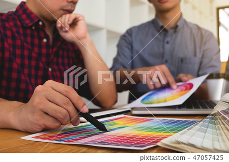 Graphic designer choose color from the color band. 47057425