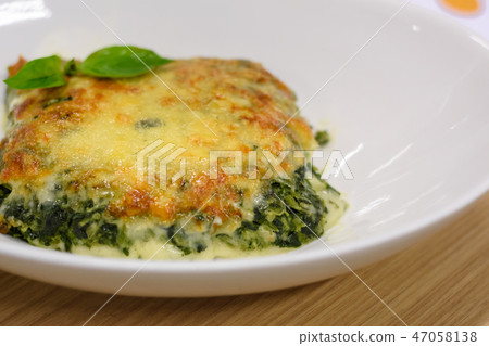 Meat pie with spinach Meat pie with spinach 47058138