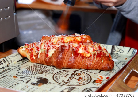 Hot croissant sandwich 47058705