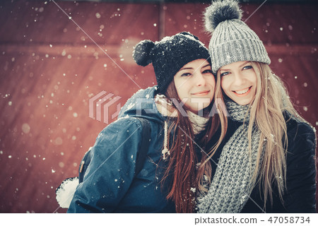 Creative funny and happy two beautiful girlfriends Creative funny and happy two beautiful girlfriends 47058734