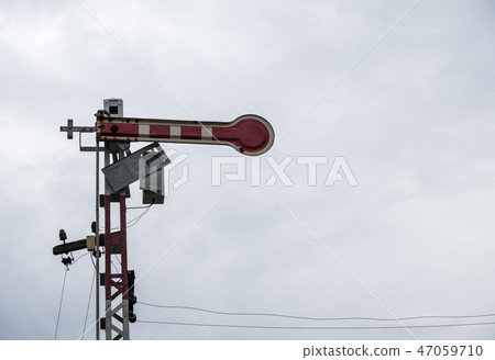Traffic signal pole in railway yard. Traffic signal pole in railway yard. 47059710