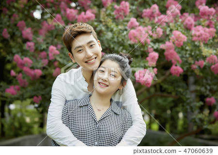 Couple, lover, student, college student, date, summer, park, forest, flower 47060639
