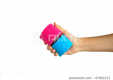 Woman hand holding kinesiotape isolated 47062222