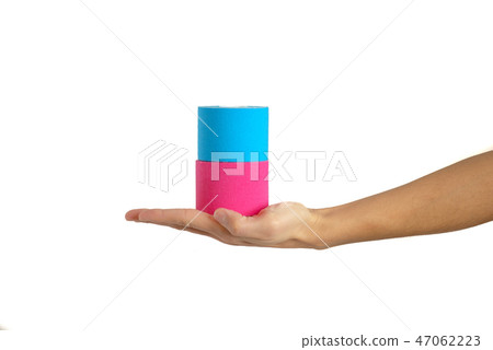 Woman hand holding kinesiotape isolated 47062223