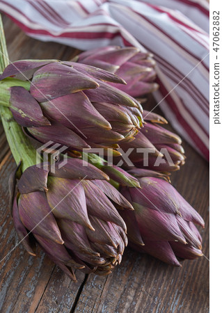 Purple artichokes Purple artichokes 47062882