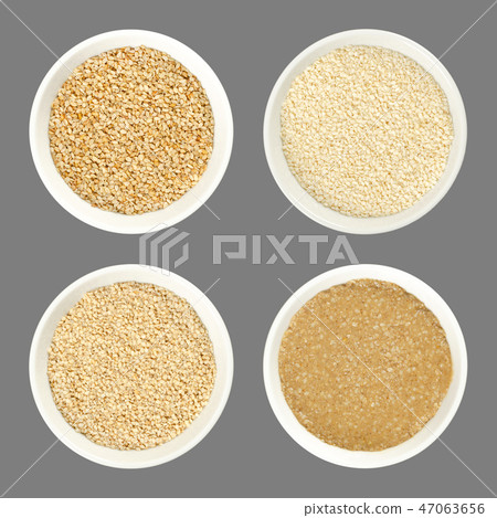 Sesame in bowls, on gray background Sesame in bowls, on gray background 47063656