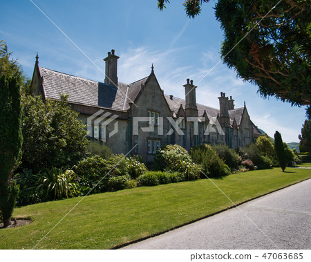 The Muckross House from the front on a sunny day The Muckross House from the front on a sunny day 47063685