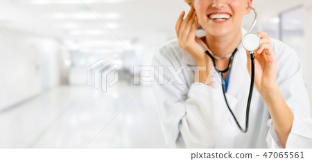 Woman doctor working at the hospital office. 47065561