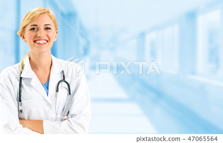 Woman doctor working at the hospital office. Woman doctor working at the hospital office. 47065564