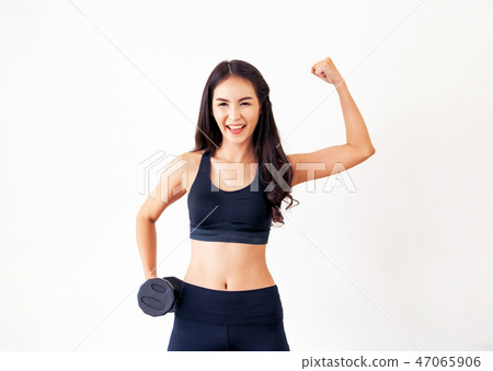 Sporty woman workout with dumbbell. Sporty woman workout with dumbbell. 47065906