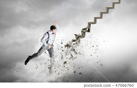 Man breaking ladder Man breaking ladder 47066760
