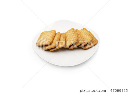 Cookies on a plate. 47069525