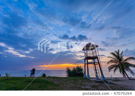 sunset above guard tower at Karon beach Phuket sunset above guard tower at Karon beach Phuket 47070264