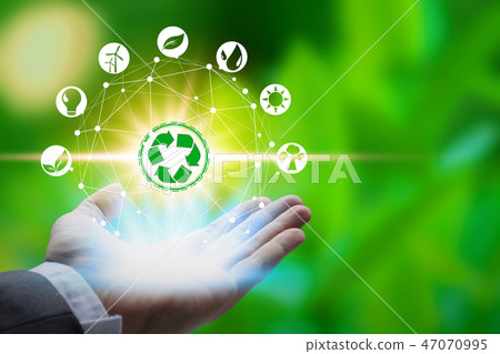 Hand holding with environment icons  47070995