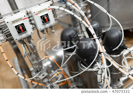 Cheese-making equipment of cheese factory background 47073331