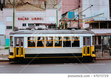 Famous old historic tourist yellow street tram in Lisbon. Famous vintage tourist travel attraction 47073729