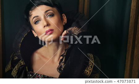 Girl in retro dress Girl in retro dress 47073871