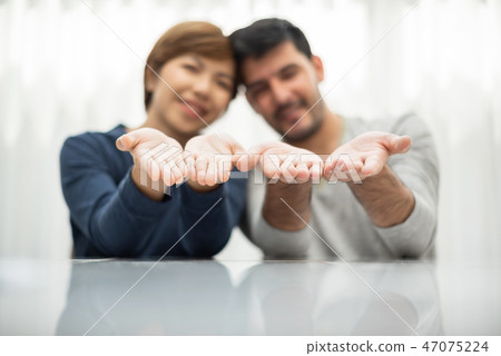 Young couple holding their new dream house. 47075224