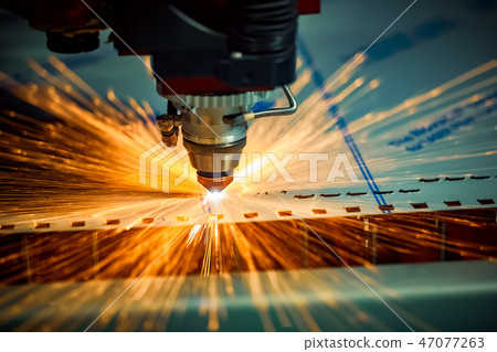 CNC Laser cutting of metal, modern industrial  47077263