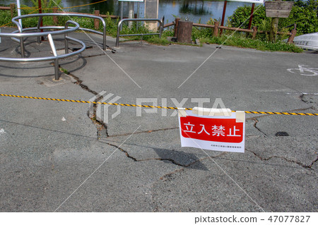 Asphalt pavement crack after earthquake 47077827