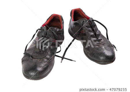 Old shoes with laces isolated 47079235