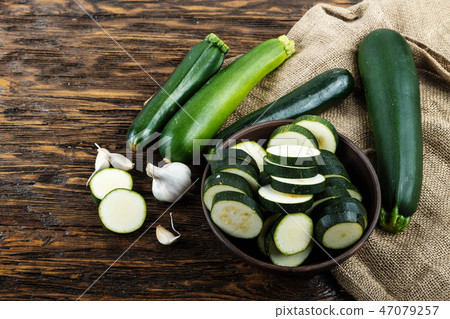 Whole and chopped zucchini 47079257