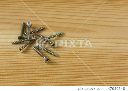 Close-up on screws, metal screws, iron screws Close-up on screws, metal screws, iron screws 47080348