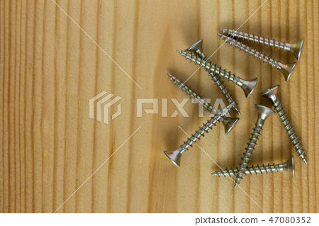 Close-up on screws, metal screws, iron screws Close-up on screws, metal screws, iron screws 47080352