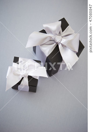 Gift box gray back copy space Gift box gray back copy space 47080847