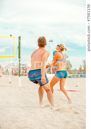 Beach Volleyball. Game ball under sunlight and blue sky. Beach Volleyball. Game ball under sunlight and blue sky. 47081336