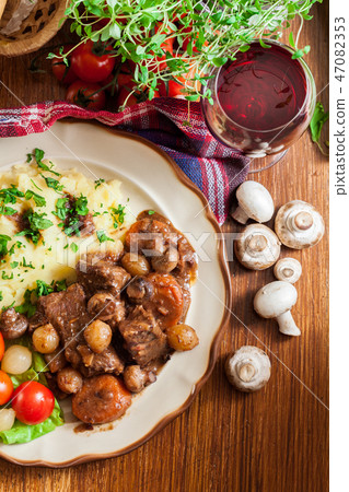 Dinner or lunch with beef Bourguignon stew 47082353