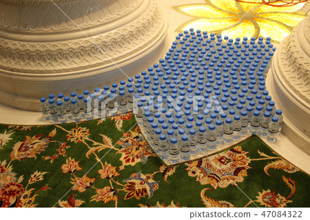 Plastic bottled water placed in Sheikh Zayed Grand Mosque Plastic bottled water placed in Sheikh Zayed Grand Mosque 47084322
