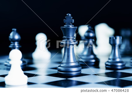 Close up chess pieces on chessboard Close up chess pieces on chessboard 47086428