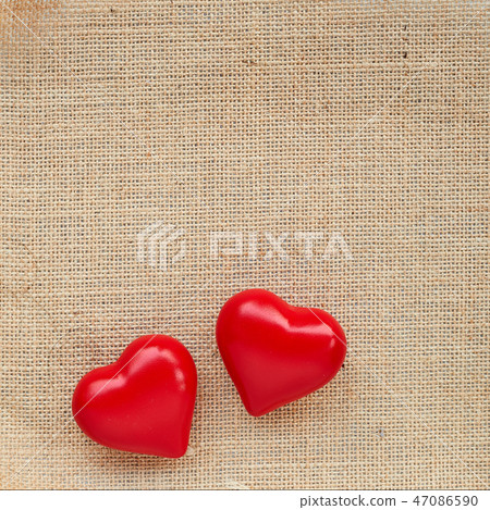 Red ball heart on the sackcloth Red ball heart on the sackcloth 47086590