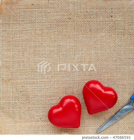 Red ball heart on the sackcloth Red ball heart on the sackcloth 47086591