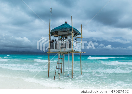 Beach guard rescue tower in Boracay at cloudy day, Philippines Beach guard rescue tower in Boracay at cloudy day, Philippines 47087462