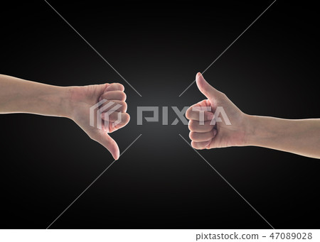 Like - unlike hand with thumb up - down symbolic Like - unlike hand with thumb up - down symbolic 47089028