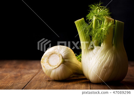 ripe fennel root on a black 47089296