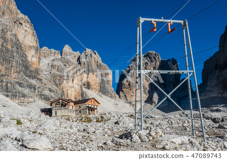 Mountain landscape and alpine hut  47089743