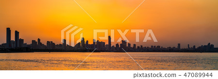Skyline of Kuwait City at sunset. 47089944