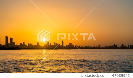 Skyline of Kuwait City at sunset. 47089945