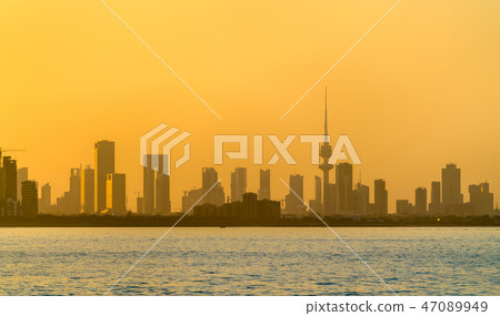 Skyline of Kuwait City at sunset. 47089949