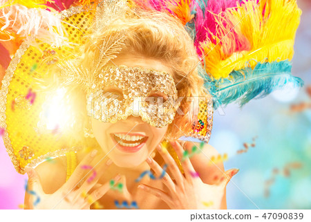 Beautiful young woman in carnival mask Beautiful young woman in carnival mask 47090839