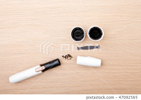 clean electronic smoke device wooden table backgro clean electronic smoke device wooden table backgro 47092565