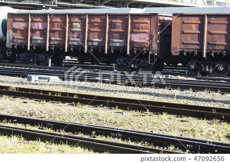 old railway wagon standing on the railway. old railway wagon standing on the railway. 47092656